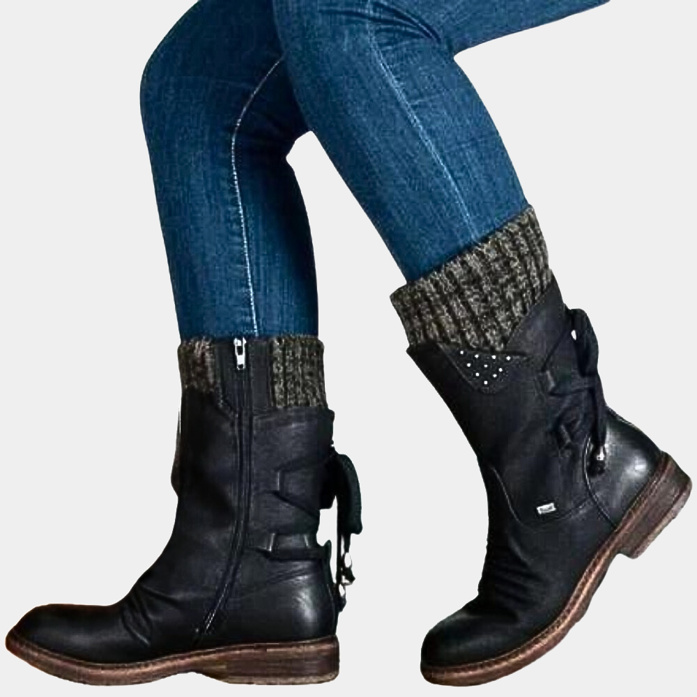 Marisol black mid-calf winter boots with knit cuff and stud detail, both feet shown