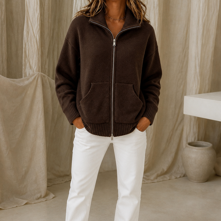 Marisol pink zip-front cardigan worn outdoors on city sidewalk