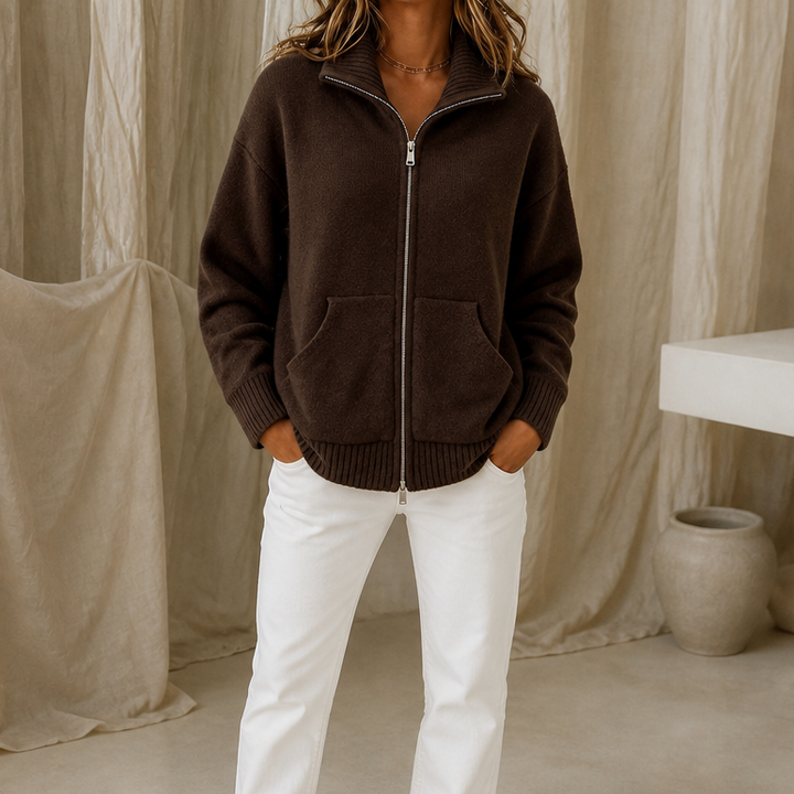 Marisol pink zip-front cardigan worn outdoors on city sidewalk