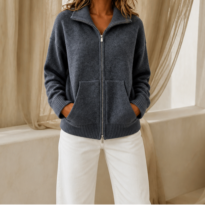 Marisol pink zip-front cardigan worn outdoors on city sidewalk