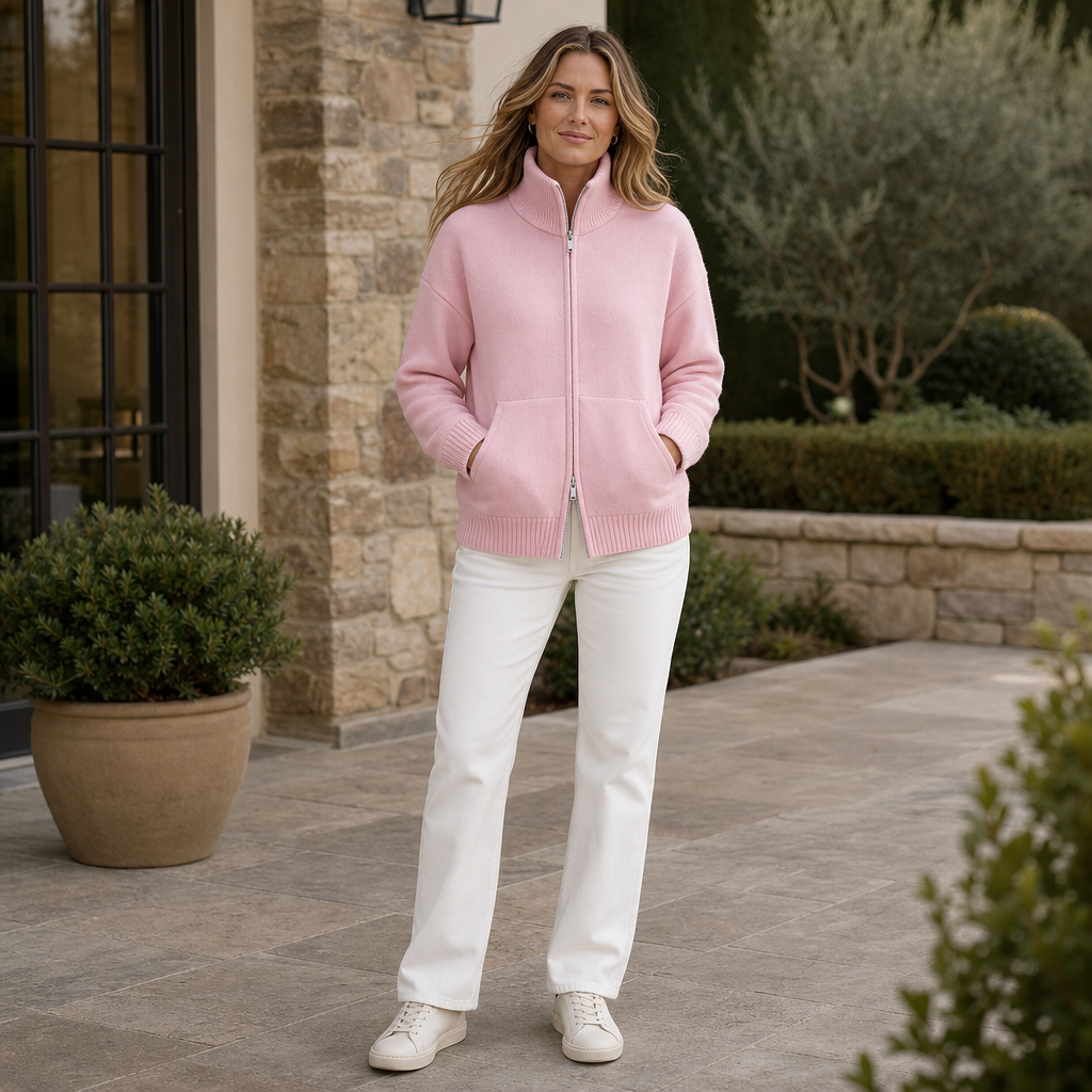 Marisol pink zip-front cardigan worn outdoors on city sidewalk