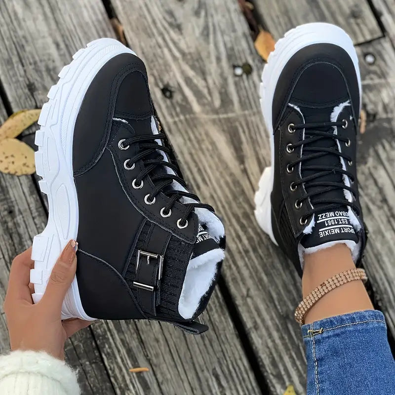 Marissa black lace-up chunky sole sneaker boots, side view on foot