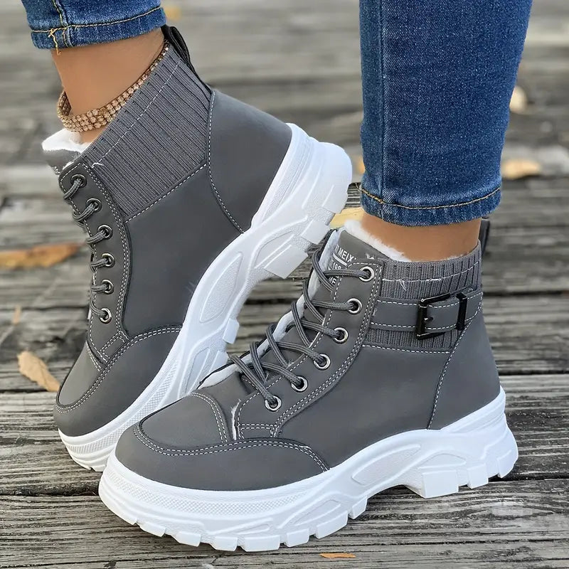 Marissa grey lace-up sneaker boots worn with jeans, side view