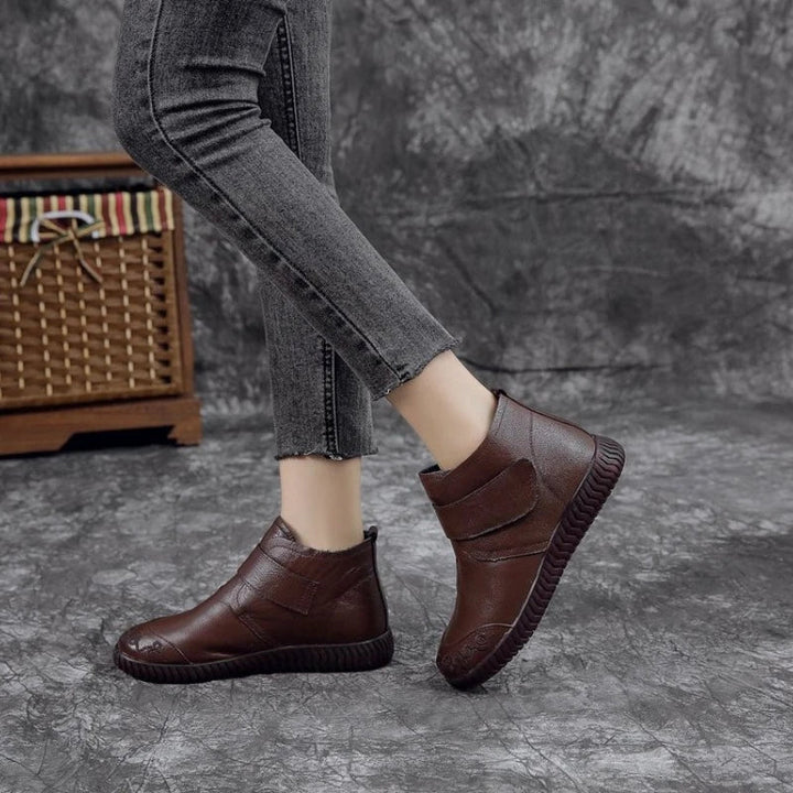 Marlene ankle boots worn while walking, side profile view