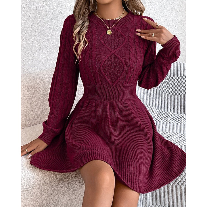 Marlowe cable-knit sweater dress, close-up front view in black