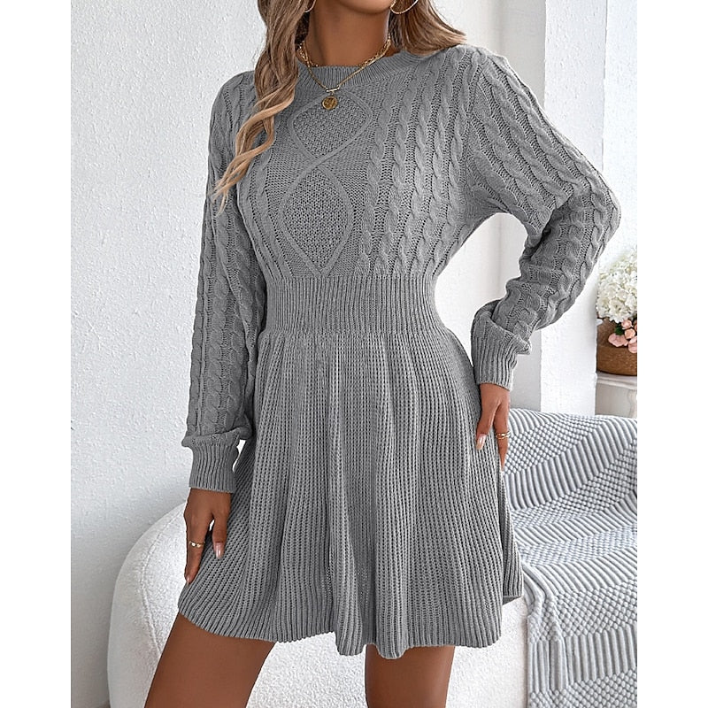Marlowe cable-knit sweater dress, front view on model in grey