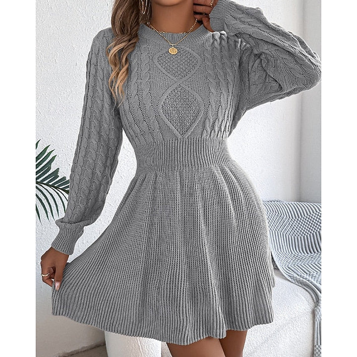 Marlowe cable-knit sweater dress, model adjusting hair, grey