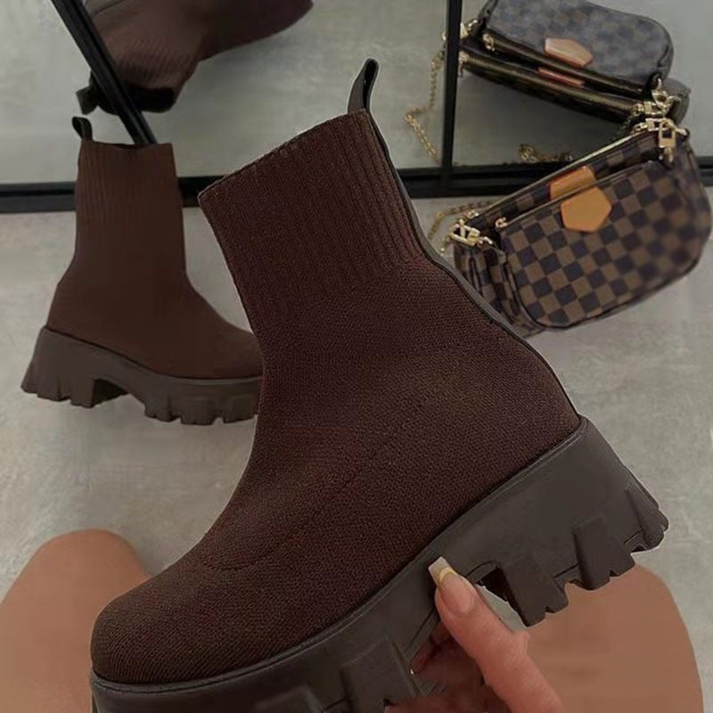 Marlowe chunky sock platform boots in brown, styled with reflection