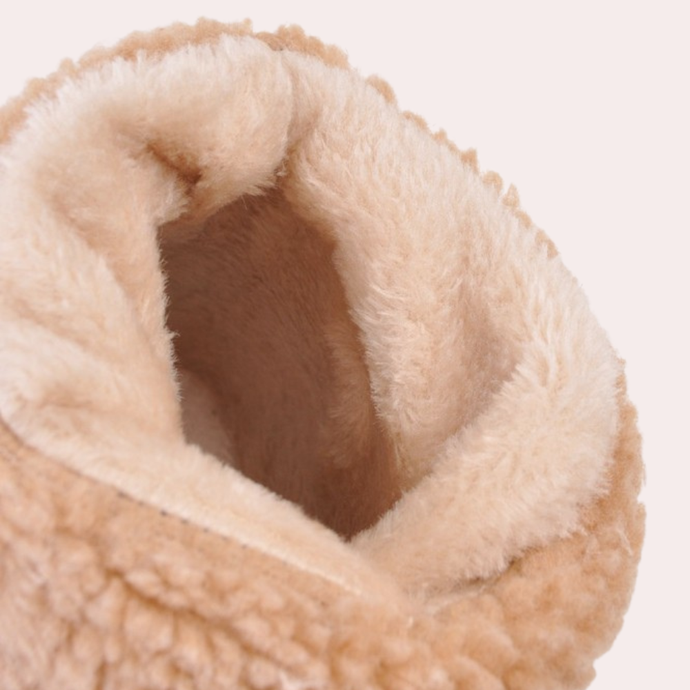 Close-up of Marlowe boot's faux fur cuff and lining detail