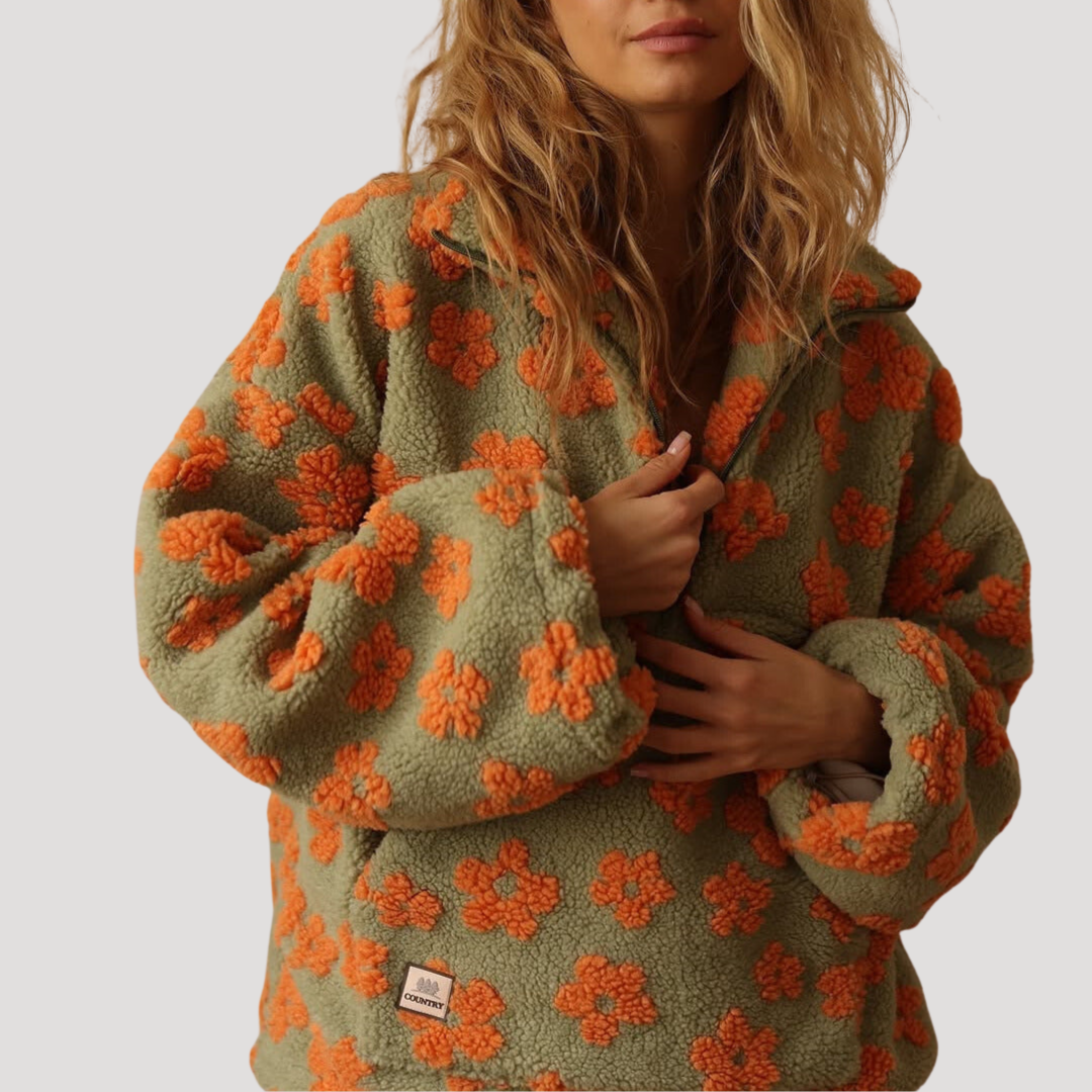 Marlowe floral half-zip sweater in orange floral print, front view close-up