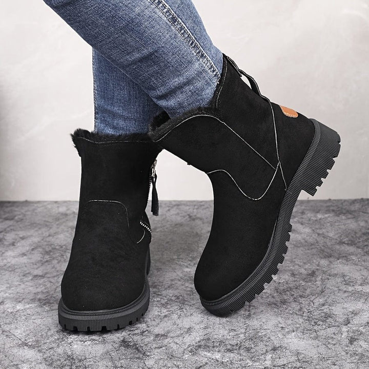 Marlowe fur lined ankle boots in black, close up back view