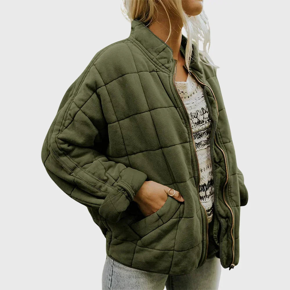 Marlowe quilted zip-up bomber jacket in olive green, front side view with hand in pocket