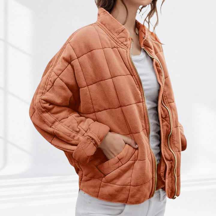 Marlowe quilted zip-up bomber jacket in rust orange, close-up front view