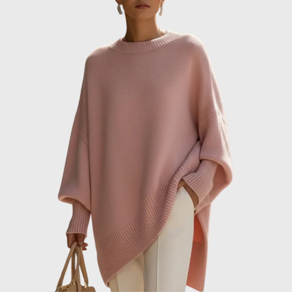 Meredith oversized pink poncho sweater with ribbed cuffs, front view