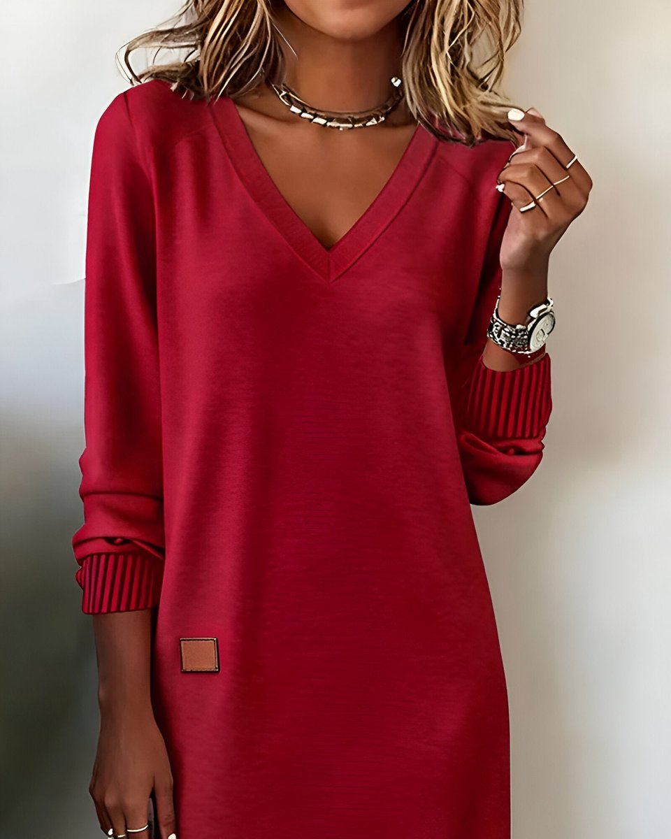 Mia red midi dress close-up of V-neckline and striped cuff