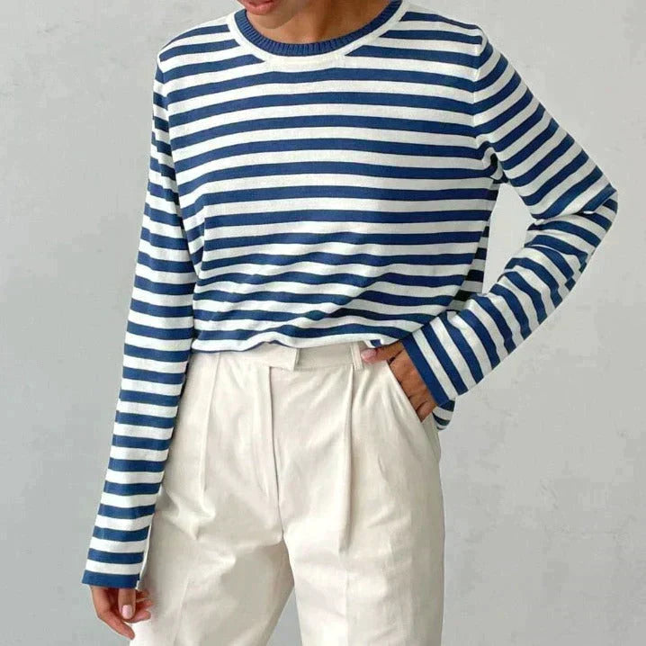 Nadia blue striped sweatshirt, front view with white pants