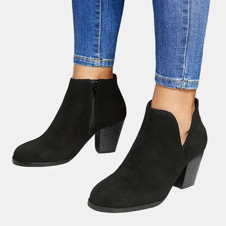 Nadine ankle boots in black, front view showing round toe and zip closure