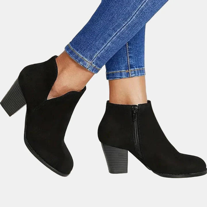 Nadine ankle boots in black, side profile showing V-cut vamp