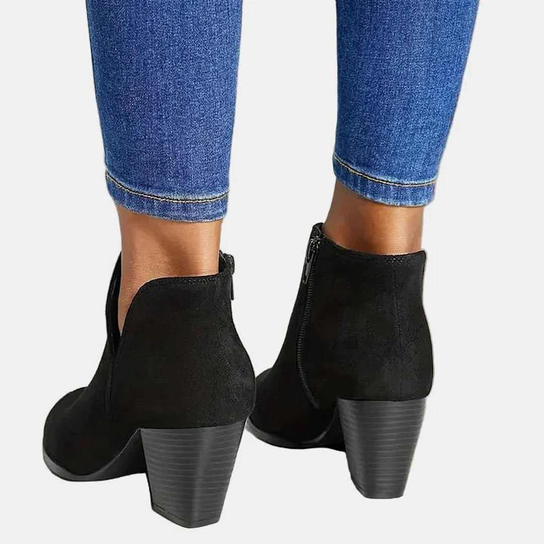 Nadine ankle boots in black, back view of stacked heel