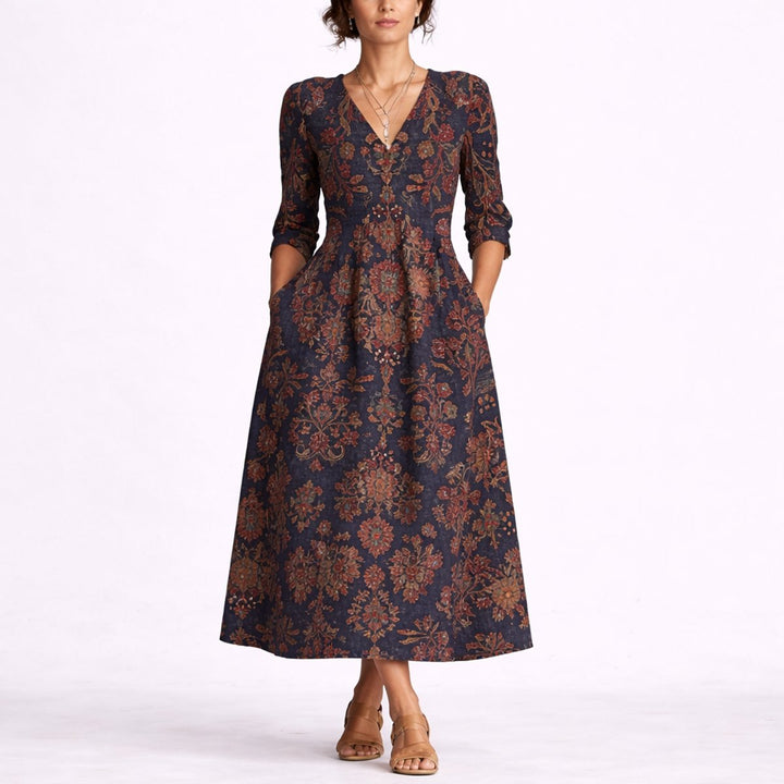 Nadine floral V-neck maxi dress front view with hands in pockets