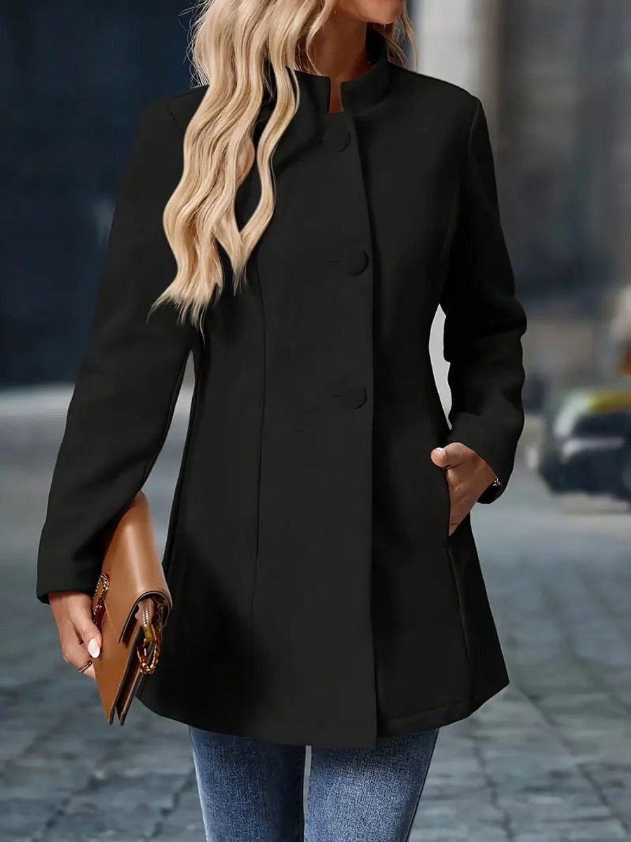 Naomi cream longline blazer coat, close-up front view with hand in pocket