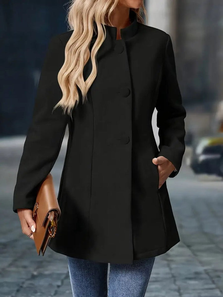 Naomi cream longline blazer coat, close-up front view with hand in pocket