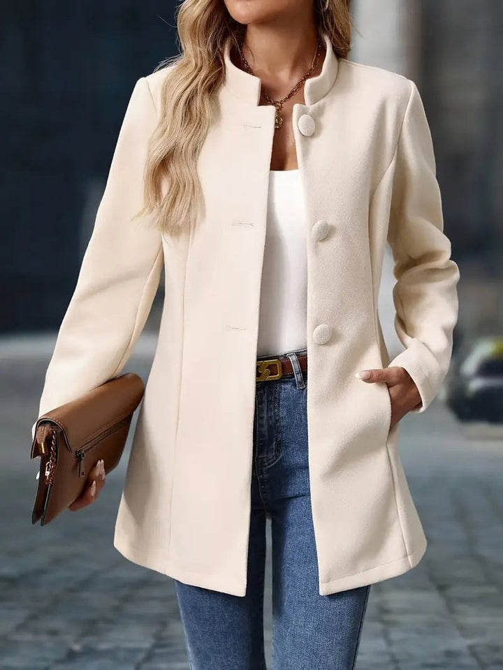 Naomi cream longline blazer coat, back view showing collar and button detail