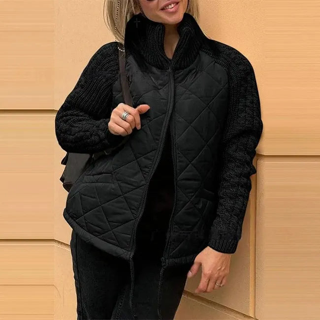 Odette quilted knit sleeve jacket in black, front view