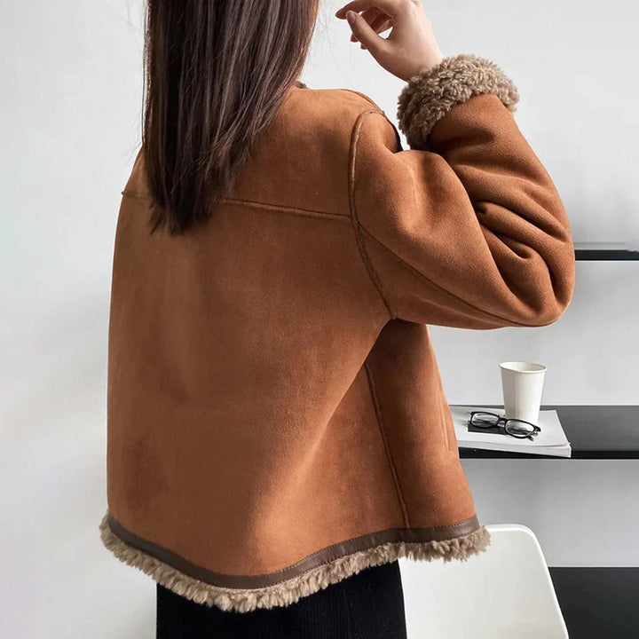 Odette shearling coat, back view showing shearling trim hem