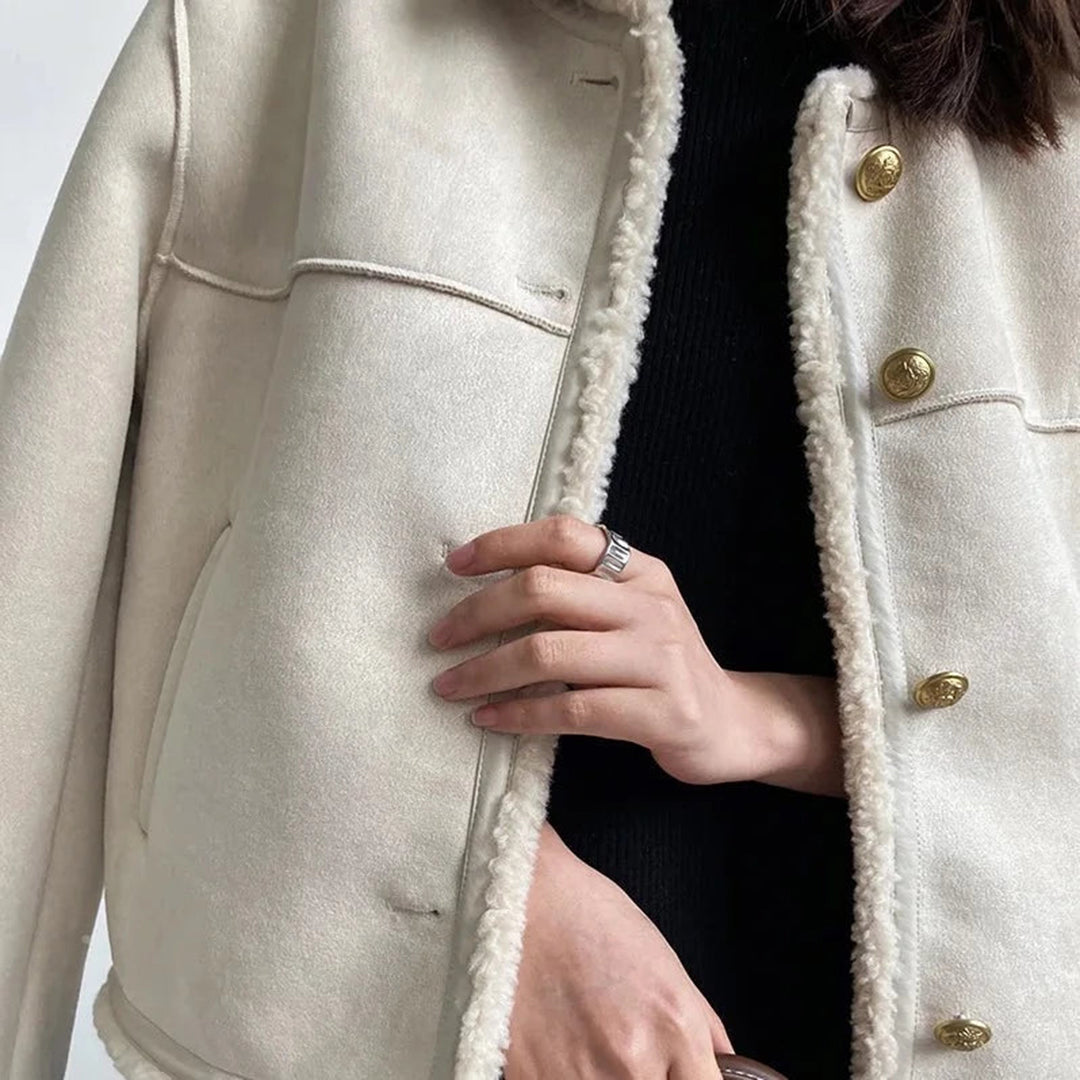 Odette shearling coat in cream, close-up front view with buttons