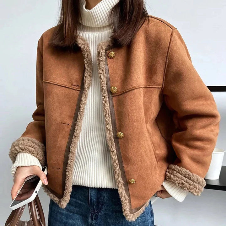 Odette shearling coat worn with turtleneck sweater, front view