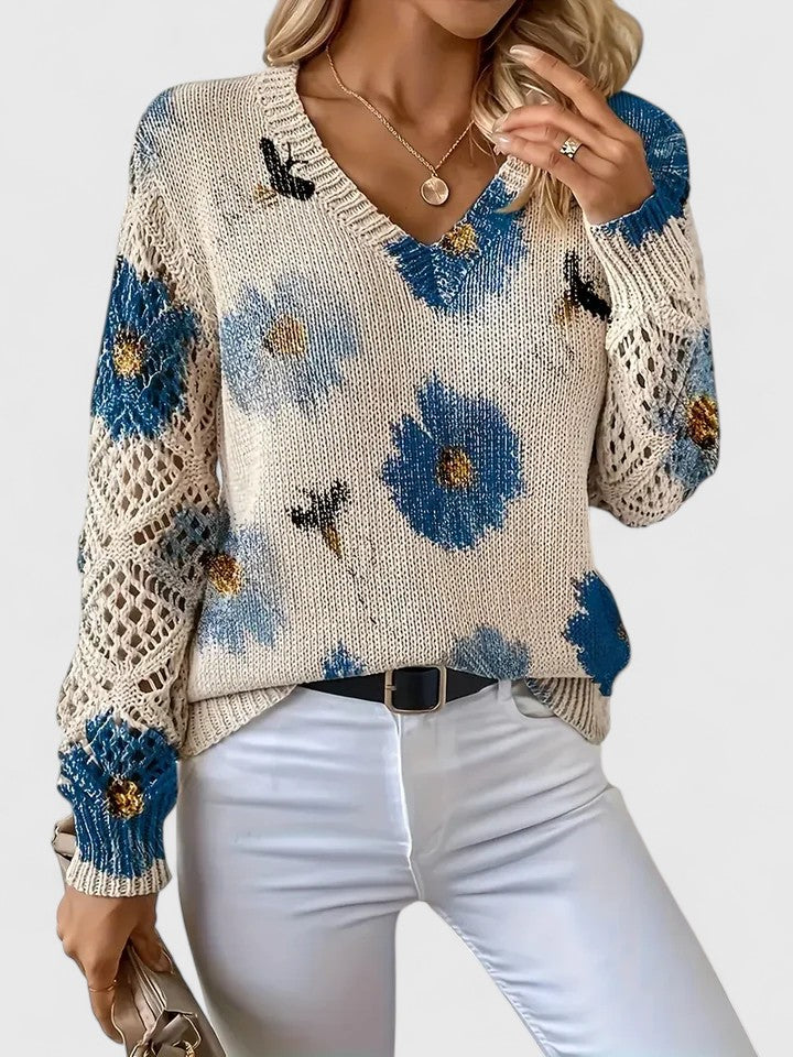 Odette floral V-neck knit sweater with blue print, close-up view