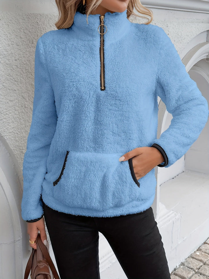 Odette blue half-zip pullover, front view with collar detail