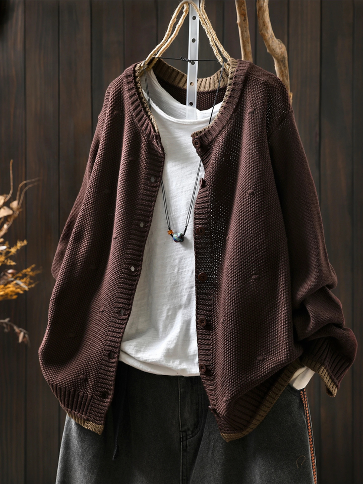 Odette oversized dark brown knit cardigan, front view with necklace