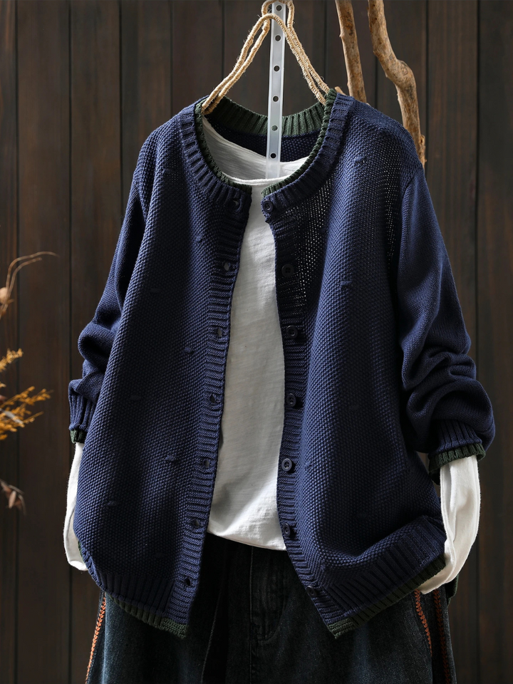 Odette oversized navy knit cardigan, front view styled with white top