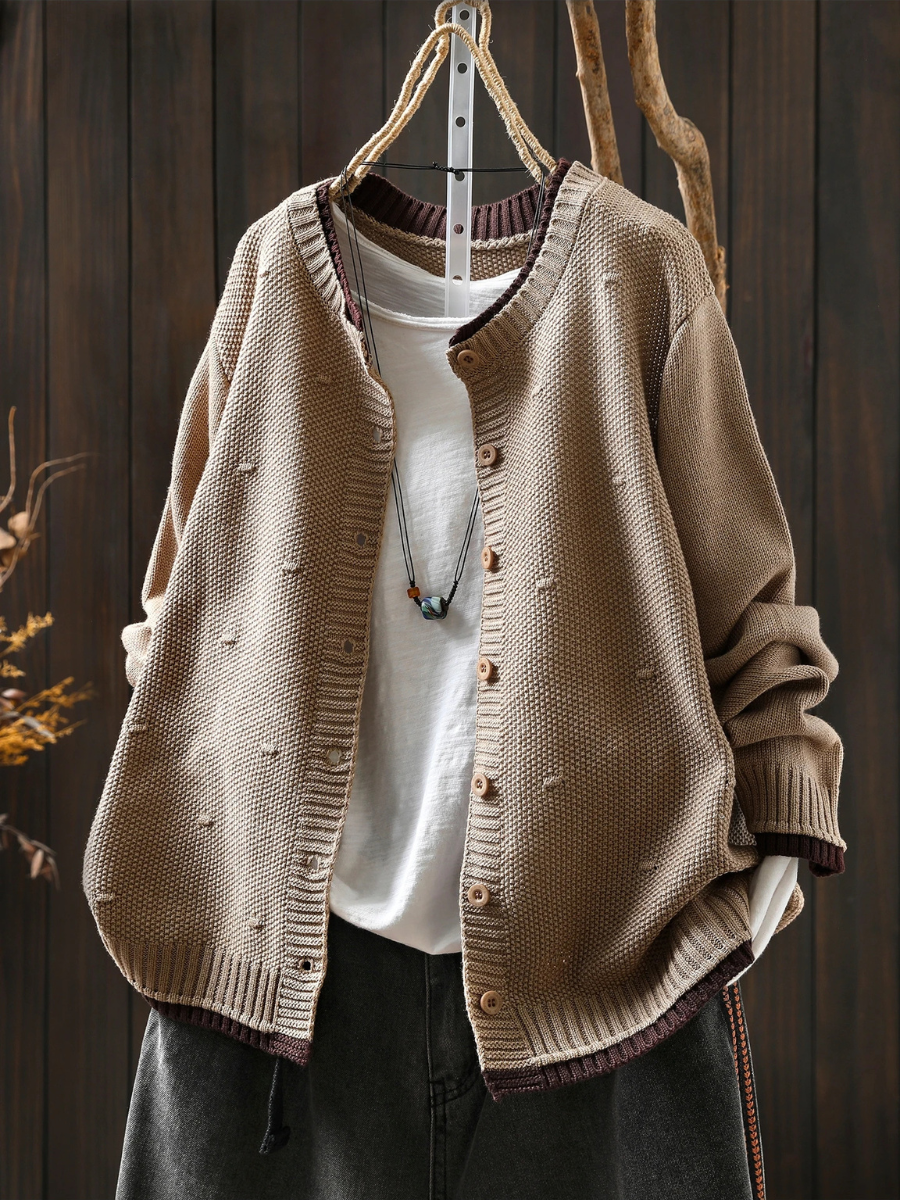 Odette oversized beige knit cardigan, front view styled with denim
