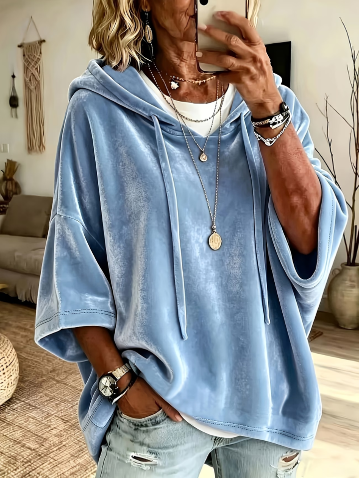 Odette oversized hooded sweater in light blue, front view