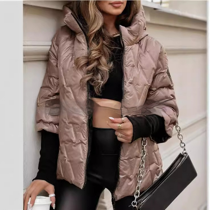Odette quilted puffer jacket close-up, styled with black leggings