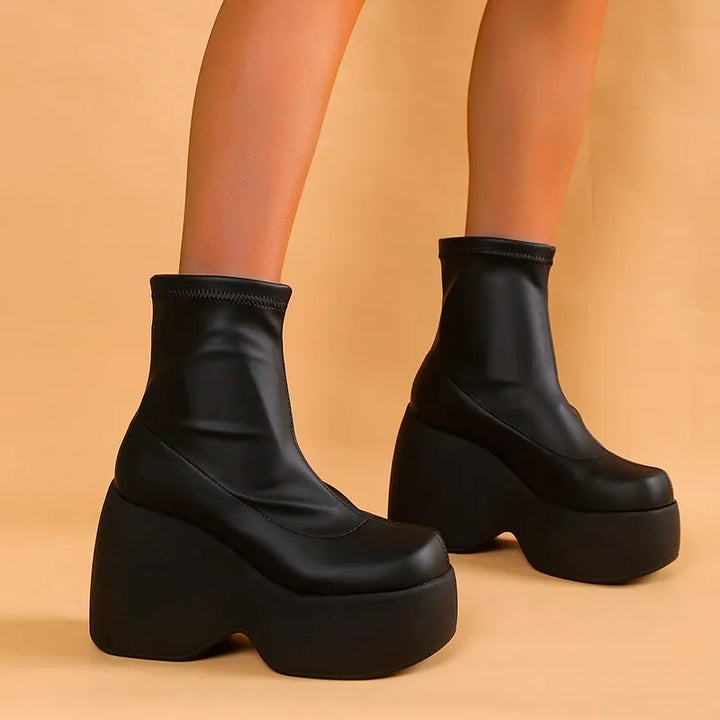 Ophelia chunky platform ankle boots, front view on model