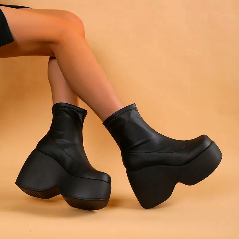 Ophelia chunky platform ankle boots, seated pose side view