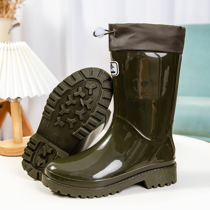 Palmer olive green rain boots with tread sole displayed side by side