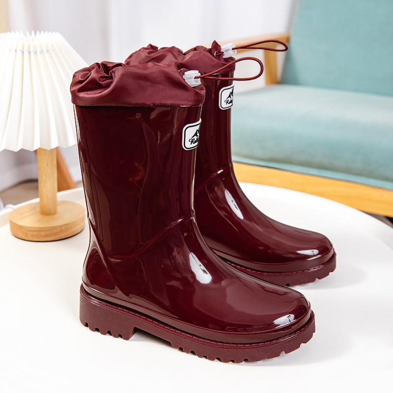 Palmer burgundy rain boots with adjustable drawstring collar, front view