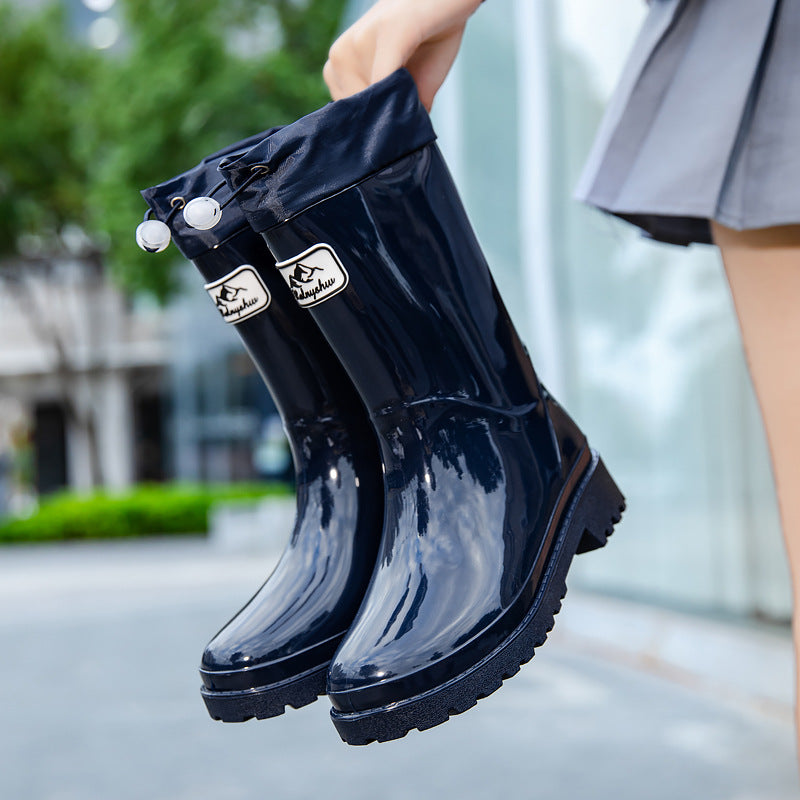 Palmer burgundy rain boots with adjustable drawstring collar, front view
