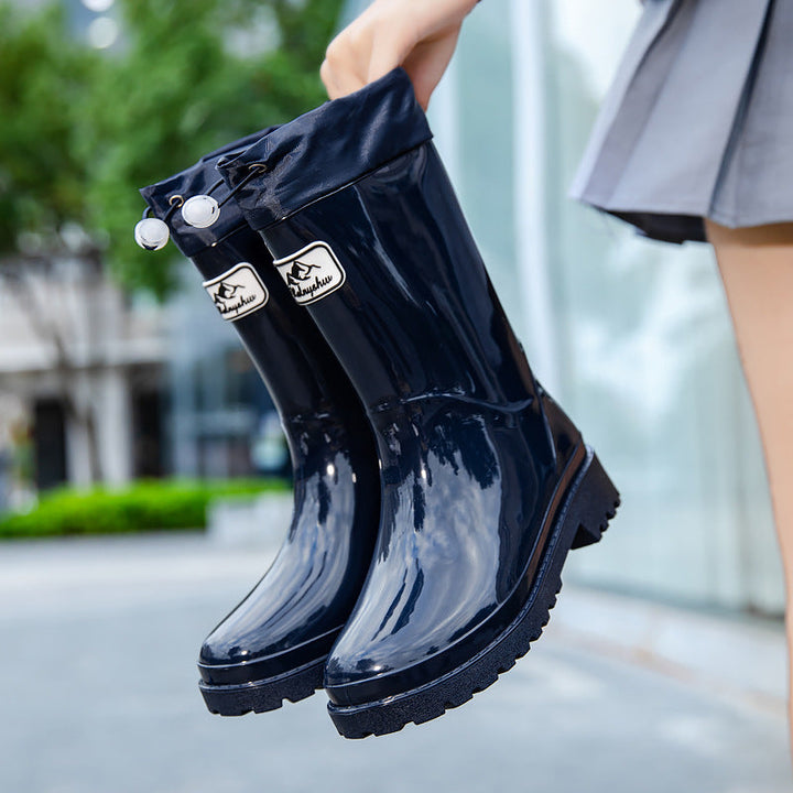 Palmer burgundy rain boots with adjustable drawstring collar, front view