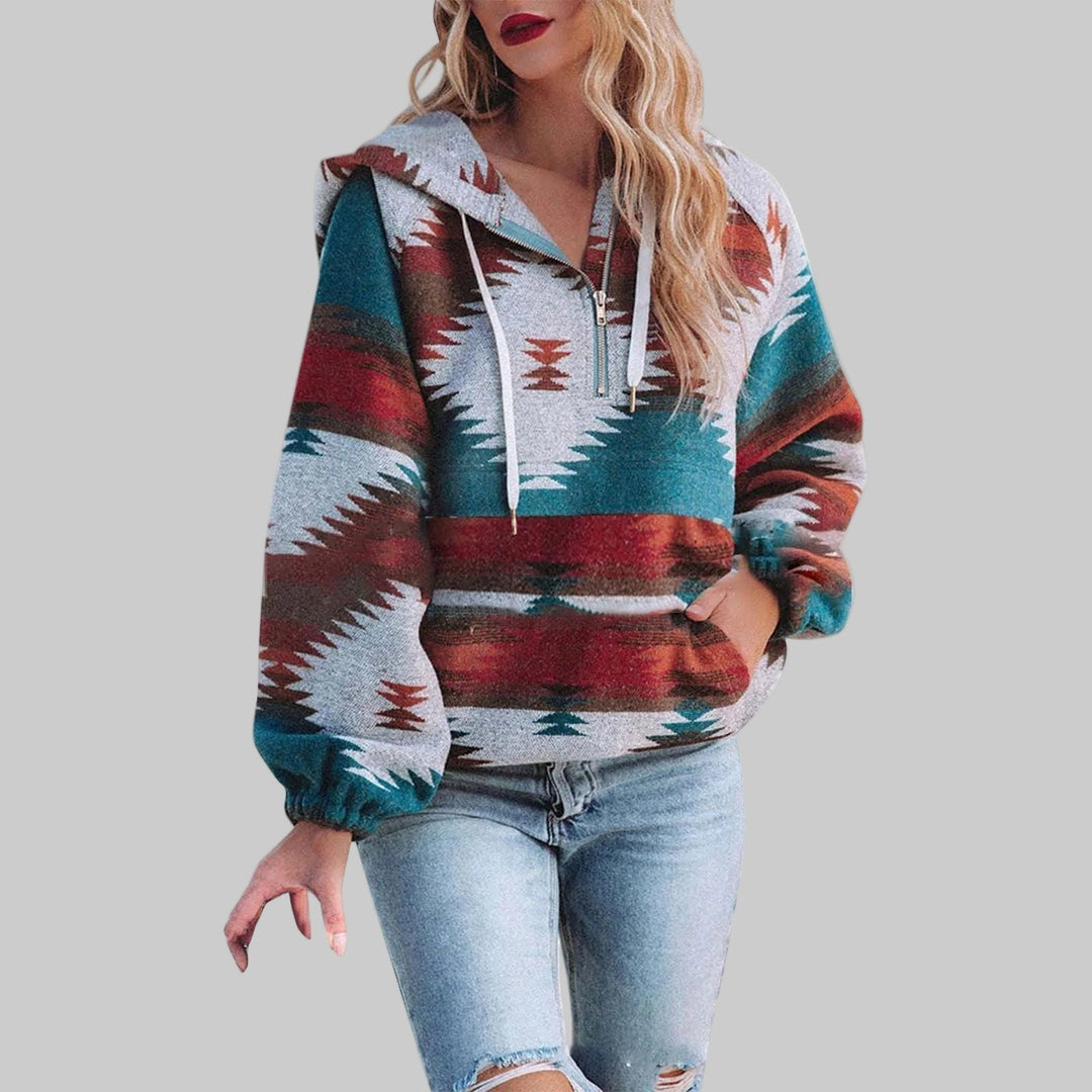Paloma Aztec print half-zip hooded sweater in teal and rust, front view