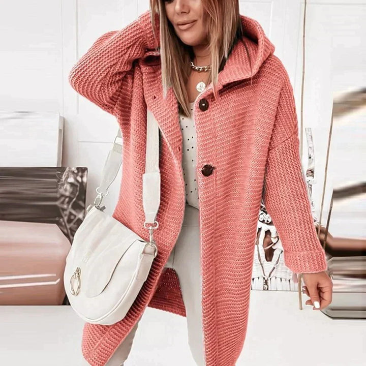 Prisca hooded long cardigan in pink waffle knit, front view with buttons and crossbody bag
