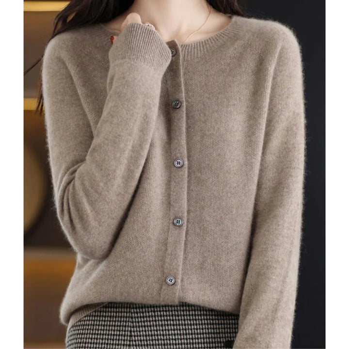 Rosalind button down cardigan in taupe, front view with hand at collar