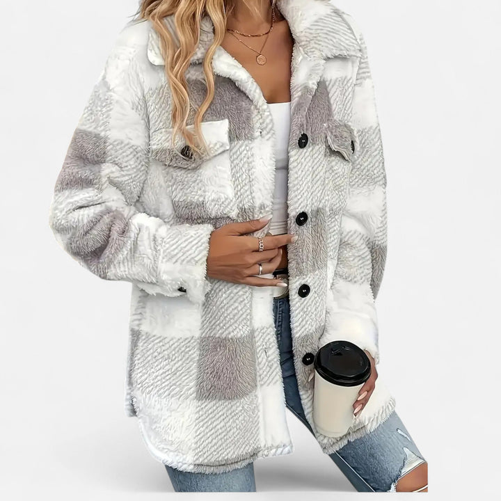 Rosalind grey checkered plush jacket, front view holding clutch