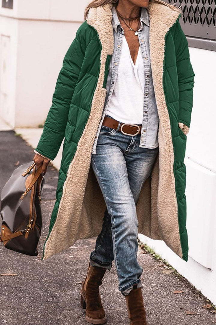 Rosalind hooded long puffer coat in green with sherpa trim, front view