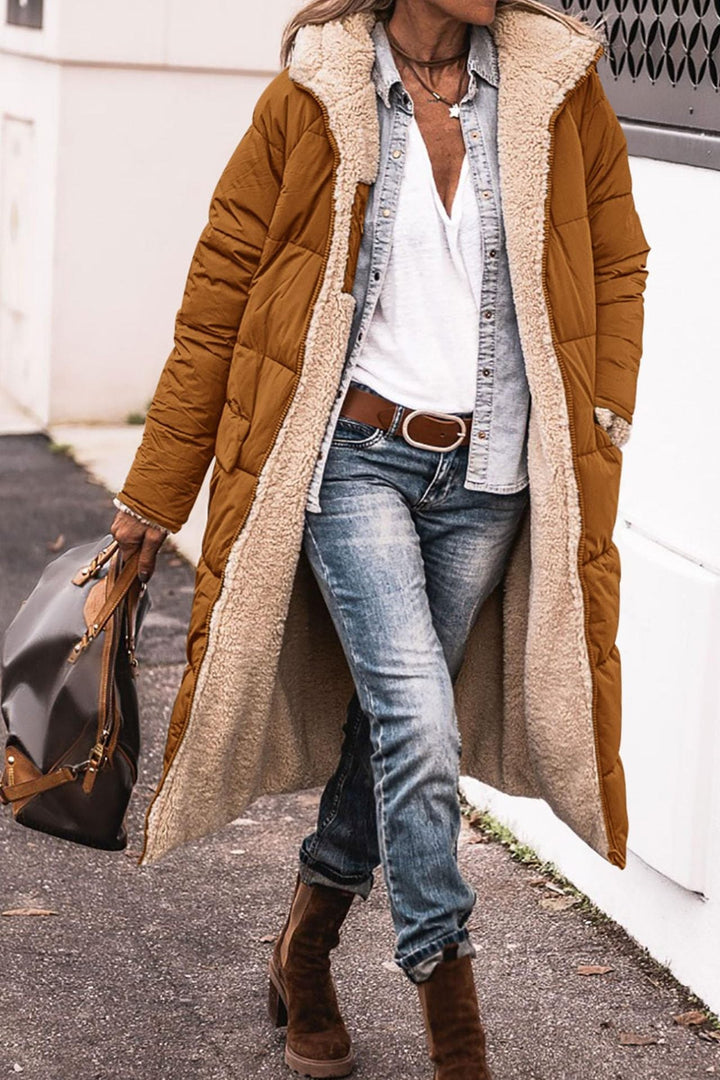 Rosalind hooded long puffer coat in camel with sherpa trim, front view